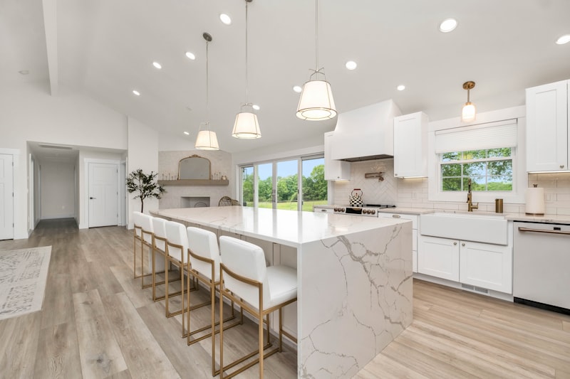 A large fitted kitchen with island